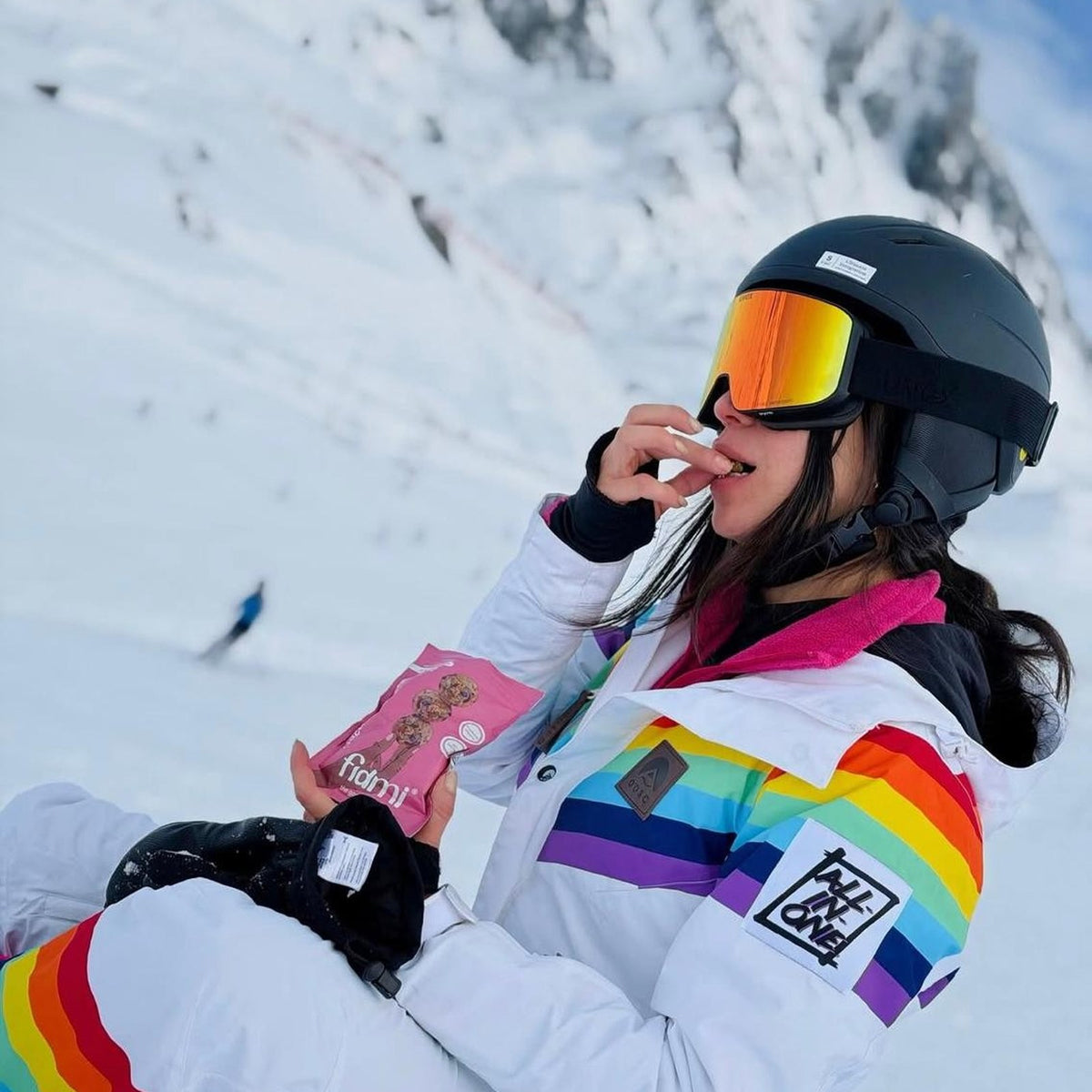 Eating a Fidmi energy ball on the slopes
